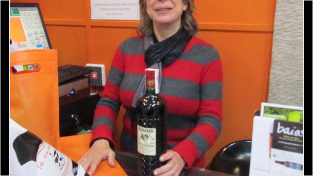 Patxarana (or Pacharan) is a Basque liquor of fermented berries and anis flavoring that is served chilled. It's a digestif (but go ahead and enjoy anytime). Pictured here is the owner of La Casa de los Quesos in Casco Viejo in the old town of Bilbao, and she makes and bottles her own. © 2013 Rob Hard Bilbao Casco Viejo La Casa de los Quesos Patxarana