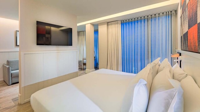 Courtesy image H10 Cubik Hotel Barcelona Junior Suite Bed View