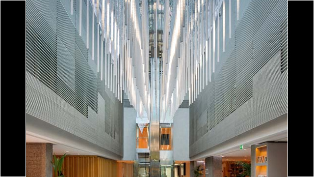 LED lights line the ceiling and create a modern experience. Courtesy image NH Eurobuilding Lobby in Madrid