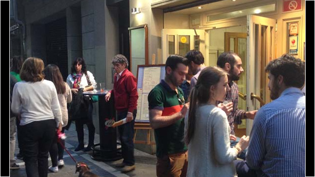 (c) Rob Hard People Enjoying Pinchos at Bar Restaurante Baserri on San Nicolas in Pamplona