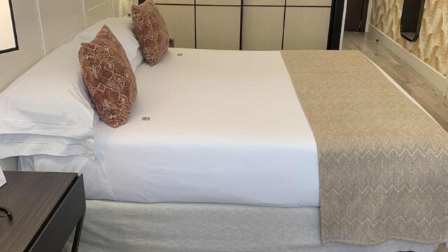 Hotel Molina Lario King Guest Room Bed.
© 2023 Rob Hard Hotel Molina Lario King Guest Room Bed