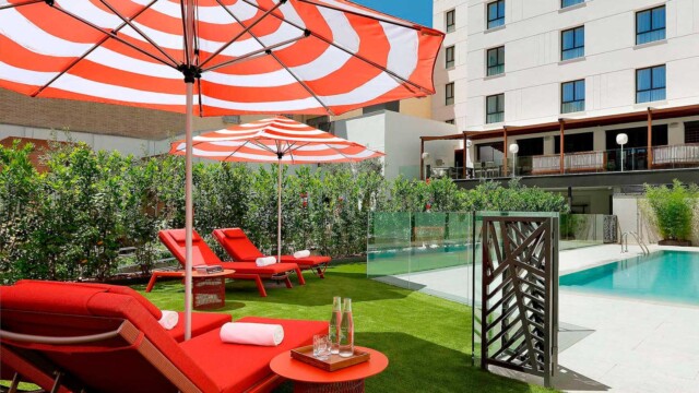 Hard Rock Hotel Madrid - Pool and Deck. Courtesy image Hard Rock Hotel Madrid Pool