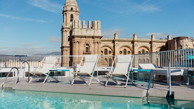 Hotel Molina Lario - Rooftop Patio View of Malaga Cathedral. Courtesy image Hotel Molina Lario Rooftop View of Malaga Cathedral