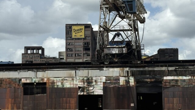View of the Dominos Sugar Plant in New Orleans Along the Mississippi. © Rob Hard 2025 View of the Dominos Sugar Plant in New Orleans Along the Mississippi