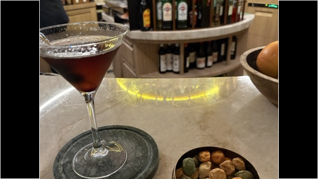 ® Rob Hard 2026 Enjoying a Cocktail at the Bar Inside Madrid Marriott Hotel Princesa Plaza
